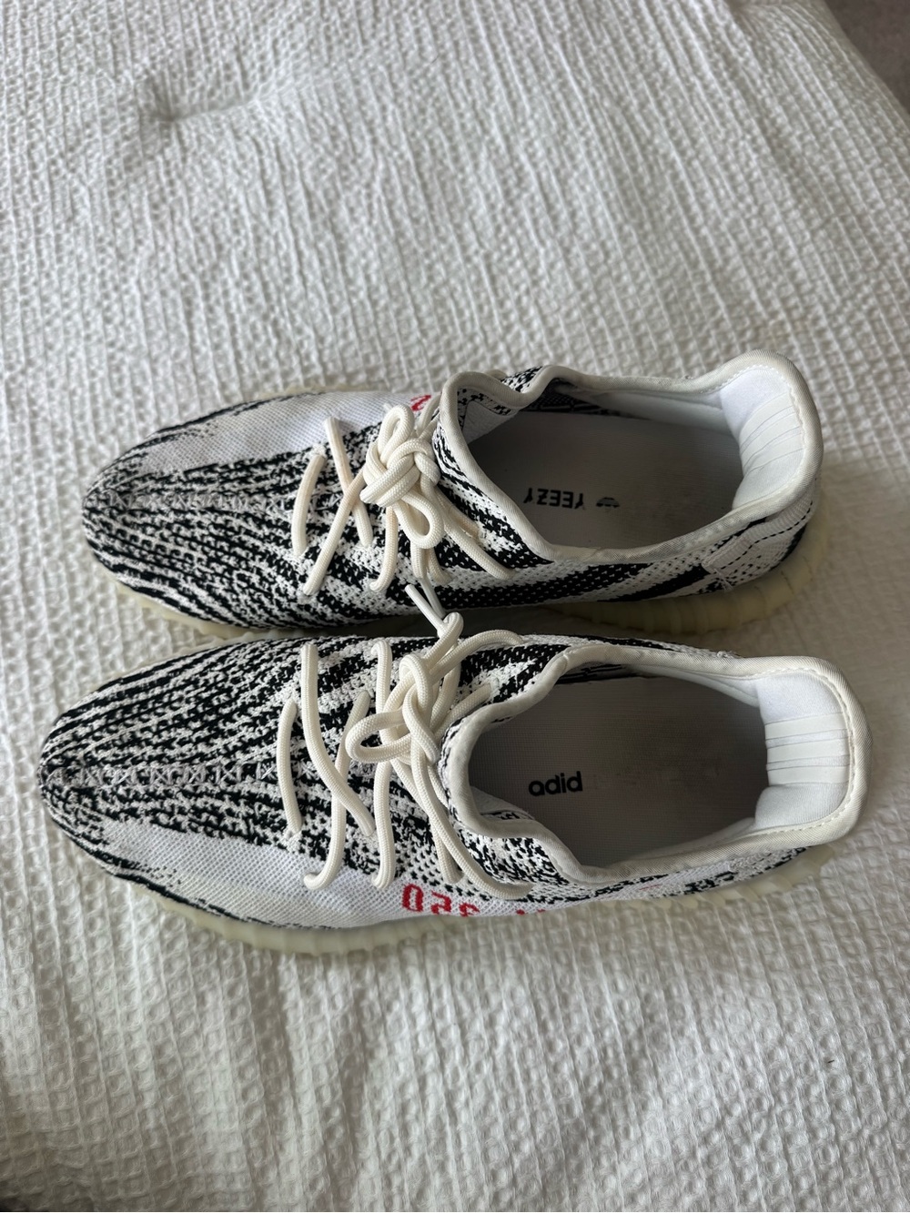 adidas Yeezy Zebra Knit Sneakers in White and Black